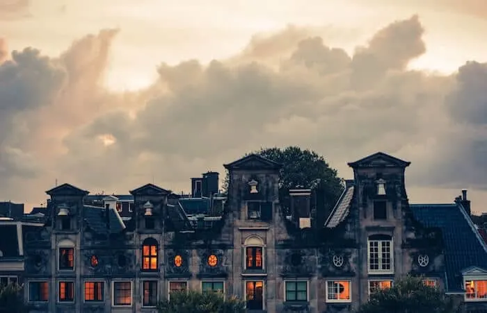 Images of rooftops along amsterdam canal to illustrate where to stay in amsterdam