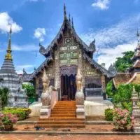 Things to Do in Chiang Mai Travel Guide Cover Image of Temple but blue sky background