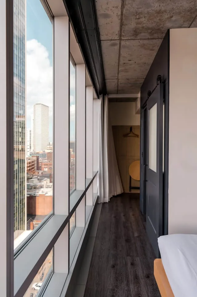 Hotel room with floor to ceiling windows in Boston Ma