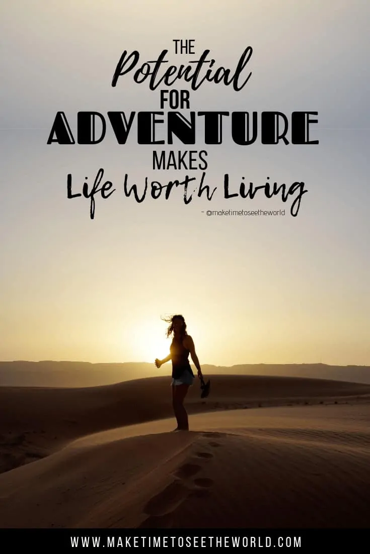 Woman with hair blowing in the wind standing on a sandune in front of thr setting sun with text overlay stating "The potential for adventure makes life worth living"