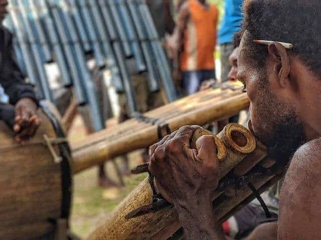 Solomon Island Man playing the pan pipes 