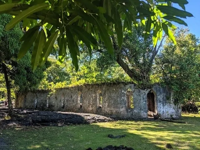 View of the ruins of the church surrounded by solid lava at the Saleaula Lava Fields in Samoa