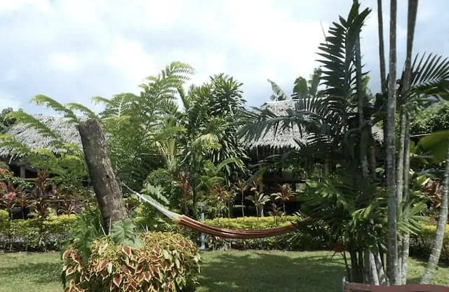 Gareden Fale surrounded by vegetation at Samoan Outrigger Hotel
