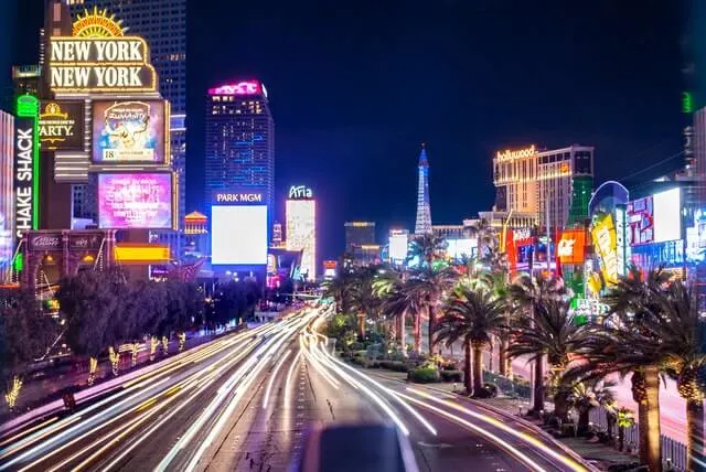 Las Vegas Strip Nevada with light trails down the street iself, hotels lit up either side