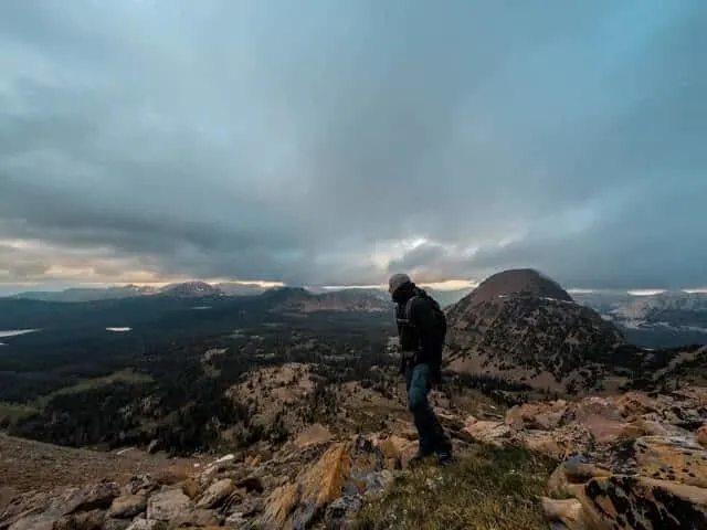 Man standing looking out over the rocky landscape of the Bald Mountain Pass