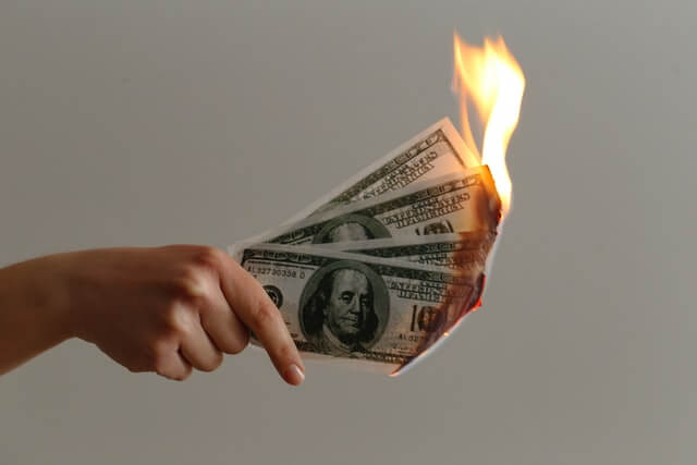 100 Dollar Bills on fire