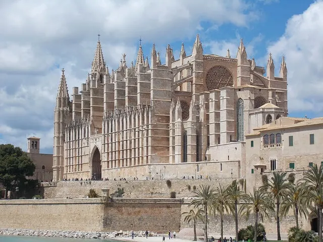 Impressive facade of the white Cathedral Of Saint Mary in Palma Mallorca