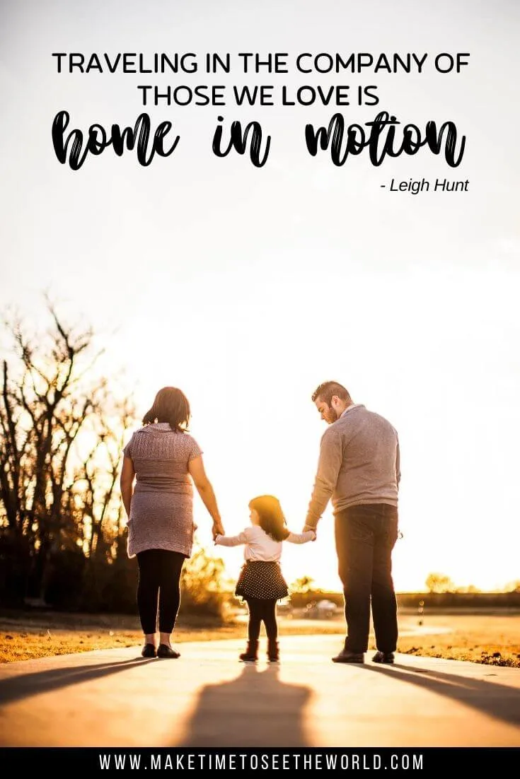 A mother and father stand either side of their little girl, each holding her hand in the middle of the road with the text overlay: Traveling in the company of those we love is home in motion