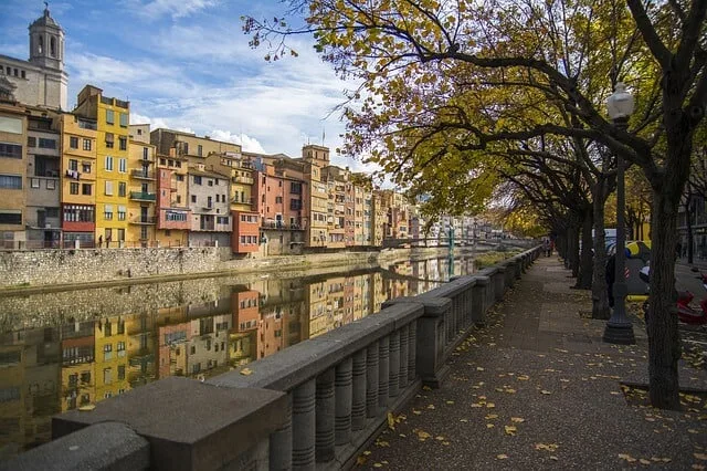 Colourful houses lining the river in Girona