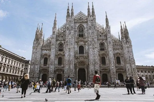 Duomo in Milan with people standing in front of it