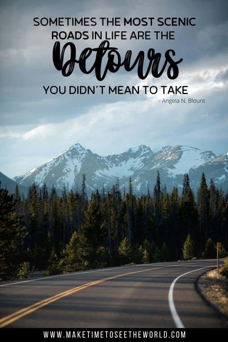 Road Trip Quote about Detours with a road curving to the right, fir trees line the road with mountains in the background