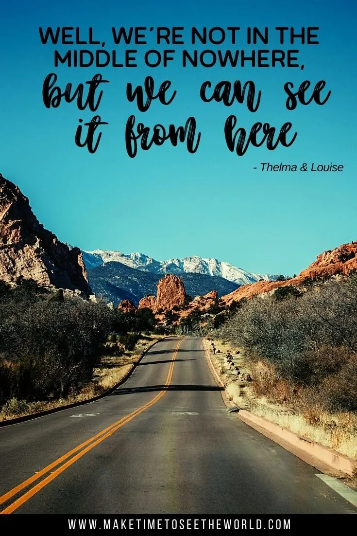 Road trip quote from Thelma and Louise: Well, we’re not in the middle of nowhere, but we can see it from here overlayed on an image of a road with cliffs either side leading to red rocks in the distance and snow capped mountains behind the rocks