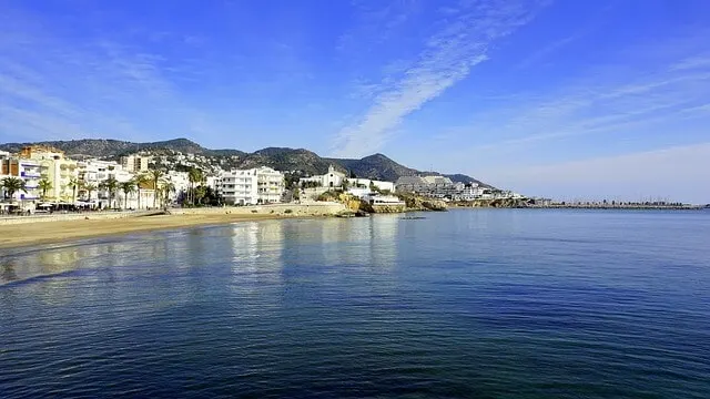 view of the beachside town Sitges from the water