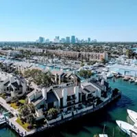 Aerial view of the waterways with houses lining the banks and boats parked around the edges - cover image foe the Top things to do in Fort Lauderdale FL