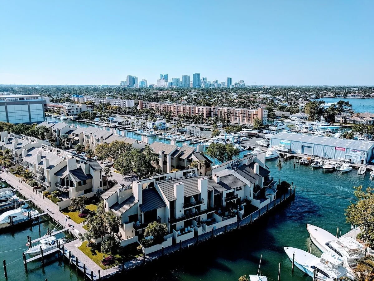 Aerial view of the waterways with houses lining the banks and boats parked around the edges - cover image foe the Top things to do in Fort Lauderdale FL