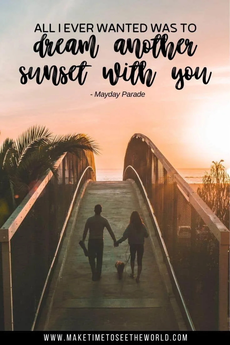 A couple with a dog on a lead walking across a bridge towards the sunset with text overlay stating: "All I ever wanted was to dream another sunset with you."