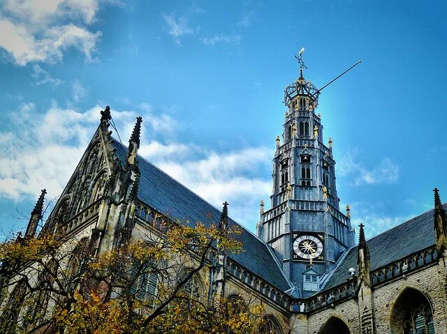 Looking up towards the main spire of the Church - De Grote of St. Bavokerk Te