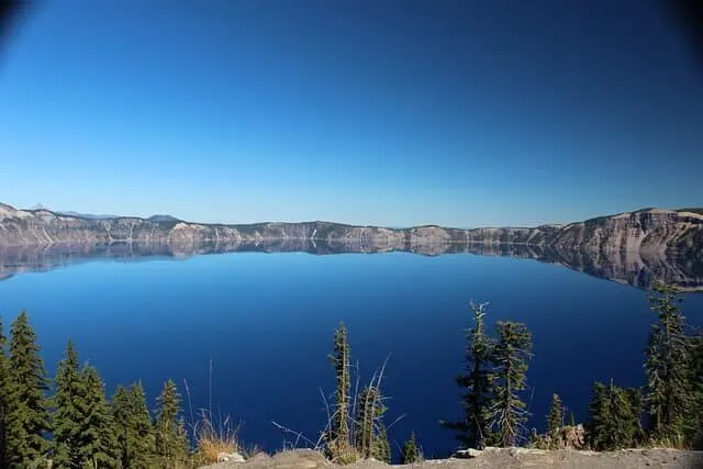 Large Blue lake inside a steep sided crater