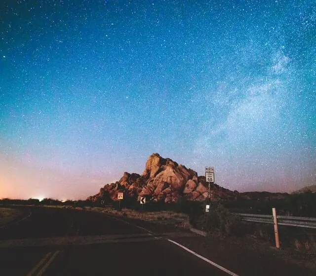 Hueco Tanks State Park & Historic Site as viewed from the road at night under the Milky Way