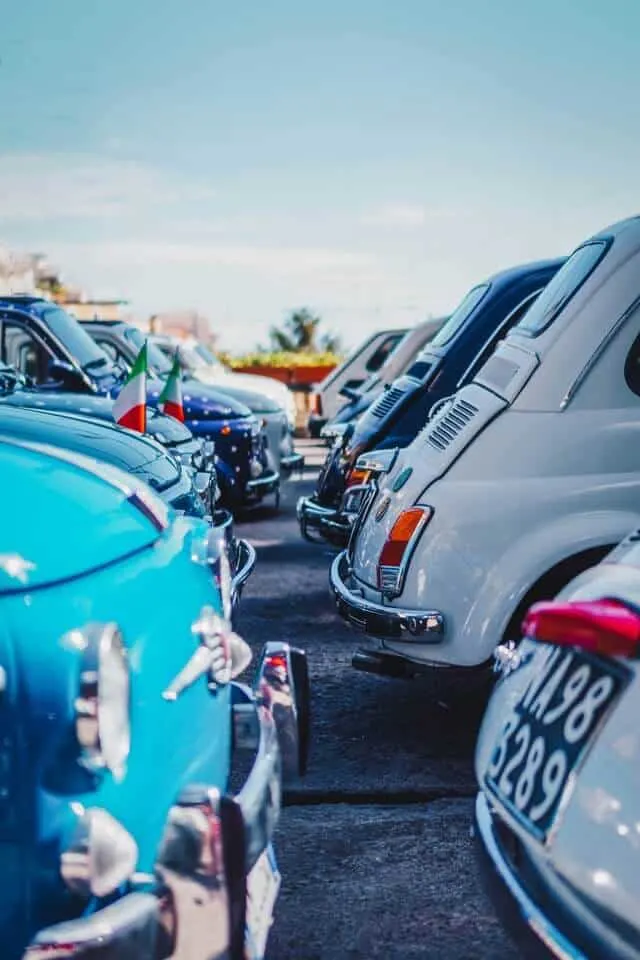 Rows of bumber to bumper Fiat 500 cars