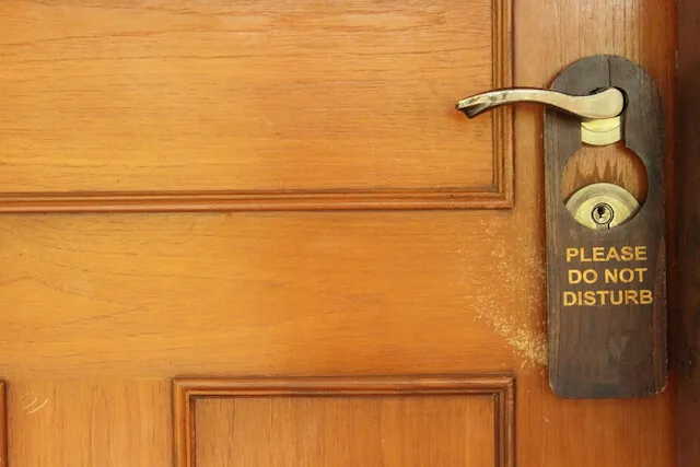 Do Not Distrub Sign on Wooden Door