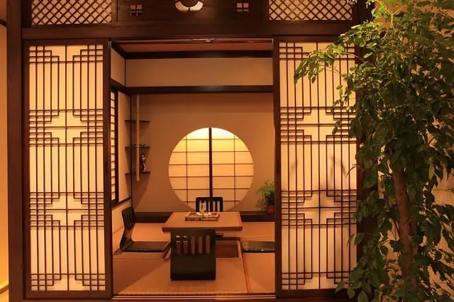 Ryokan Room with tatami mat, low table and legless chairs