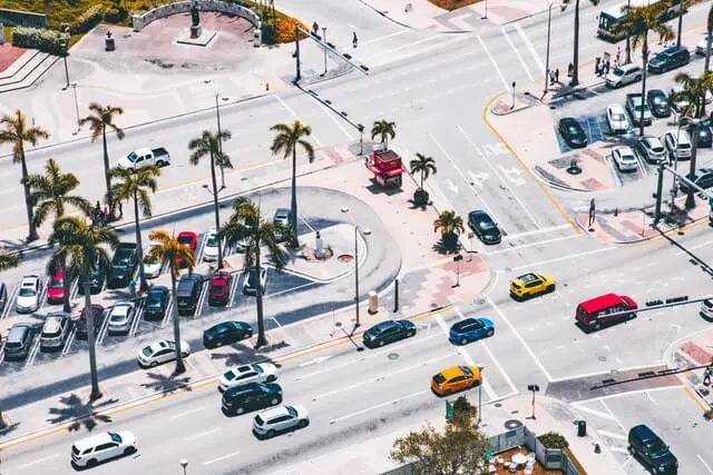 Car park in Miami from above next to a busy main road