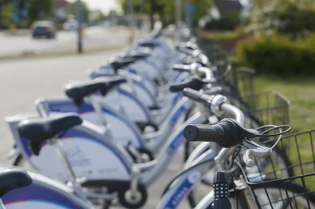 Citi Bikes lined up along the sidewalk