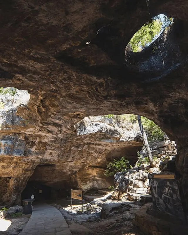 Longhorn Cavern cave system with light shining through at 3 points