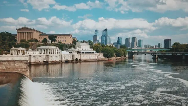 River in Philadelphia with historical buildings in the background
