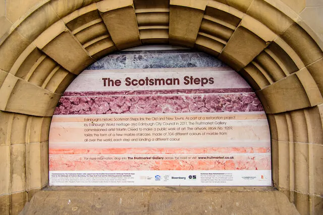 Scotmans Steps sign embedded in a stone archway