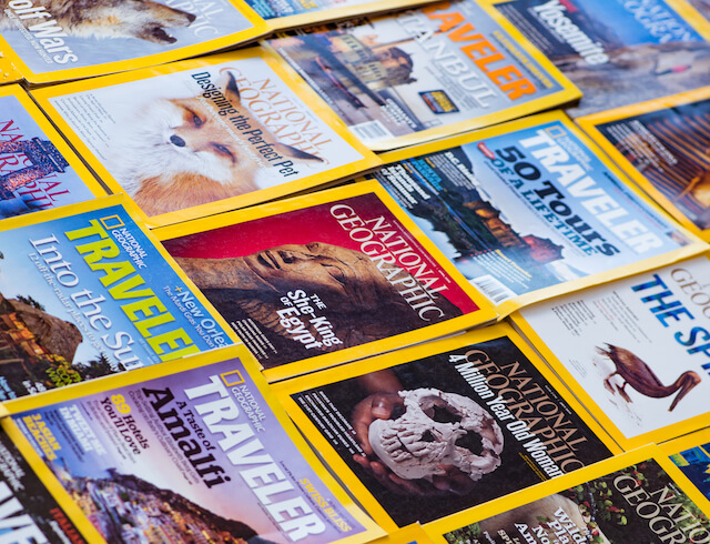 Multiple National Geographic Magazine laid out side by side in rows
