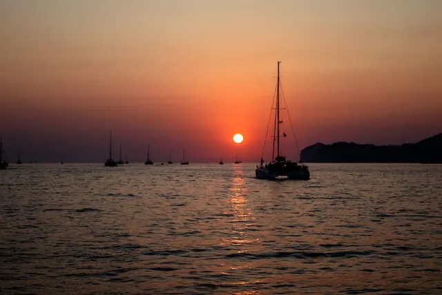 Catamarans at sunset in Santorini