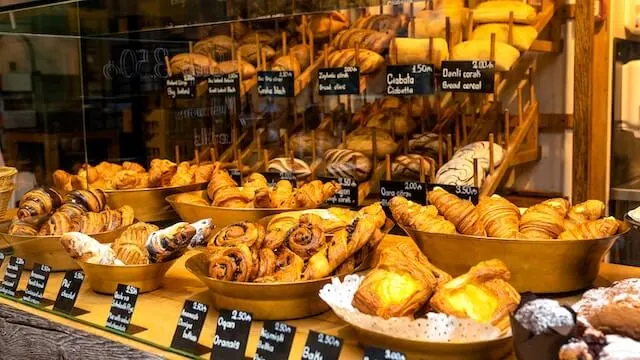 French Boulangerie display with lots of different pastries and breads