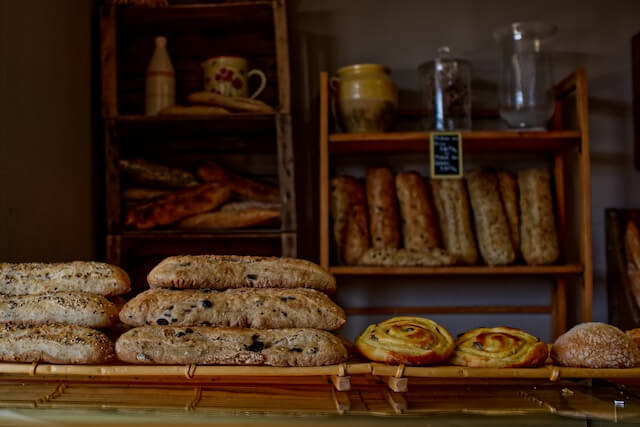 Inside a boulangerie with fresh basked goods for sale