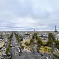 Best Viewpoints in Paris - wide angle view of the Champs Elysee and Eiffel Towel from the terrace of the Arc de Triomphe